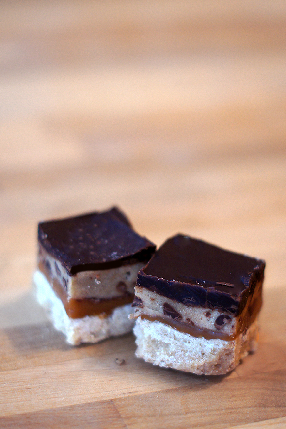 Cookie Dough Twix Bars  made with chocolate ganache, caramel, and shortbread cookies.