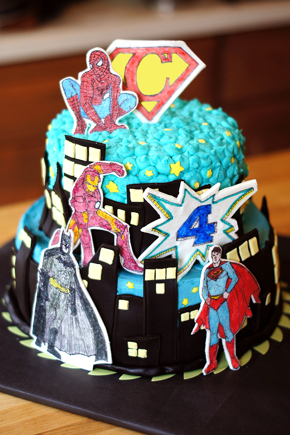 Superhero cake featuring Batman, Spiderman, Iron Man, and Superman. #funfetti #birthday